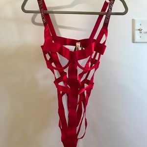 Brand new Victoria’s Secret red bondage one piece lingerie.